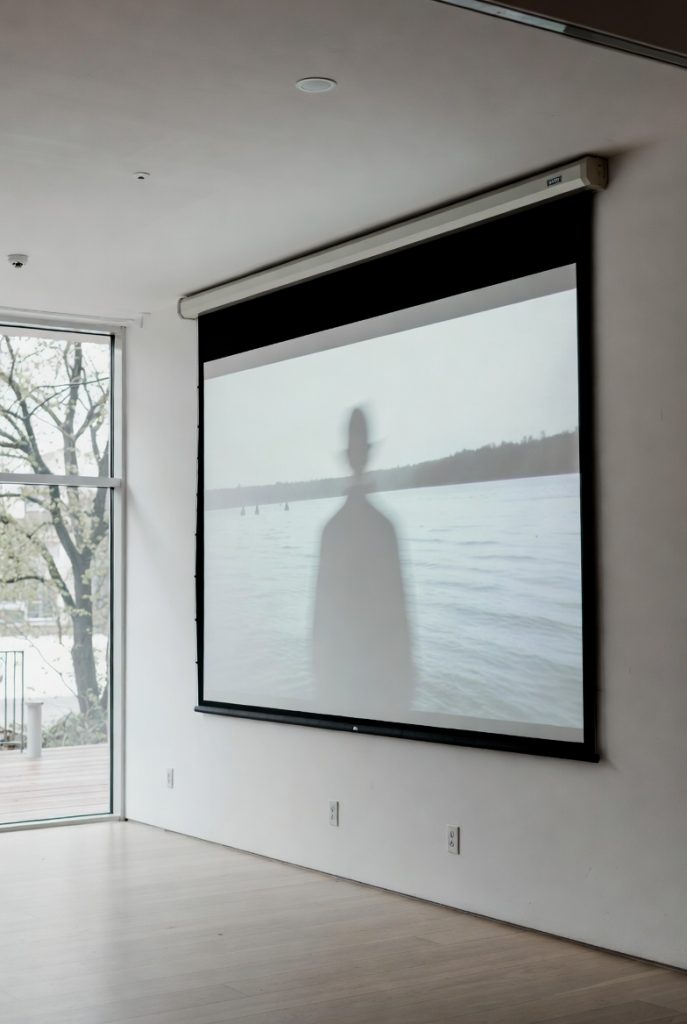 home cinema using motorized projection screen with tubular motor system