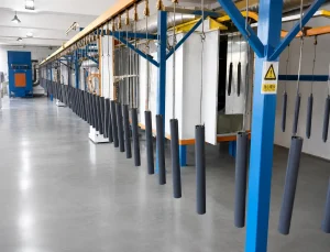 tube spray coating in tubular motor production process
